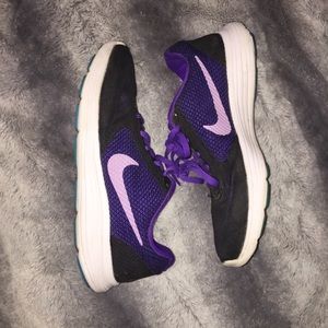 Purple Nike tennis shoes